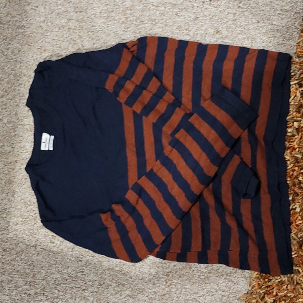 Penny stock orange striped sweater